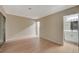 Bright bedroom featuring wood flooring, and a modern ensuite bathroom at 413 N Lamb Blvd # E, Las Vegas, NV 89110