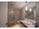 Modern bathroom with marble tile and walk-in shower at 4471 Dean Martin Dr # 3301, Las Vegas, NV 89103