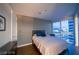 Bedroom with hardwood floors and city views at 4471 Dean Martin Dr # 3301, Las Vegas, NV 89103