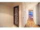 Modern hallway with hardwood floors and contemporary wall art at 4471 Dean Martin Dr # 3301, Las Vegas, NV 89103