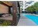 Relaxing pool area with a shaded daybed at 4471 Dean Martin Dr # 3301, Las Vegas, NV 89103