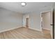 Bright bedroom with light-wood flooring, closet, and neutral walls offers a modern and clean living space at 4512 Mark Ave, Las Vegas, NV 89108