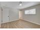 Bedroom featuring light-colored walls and a window for natural light at 4512 Mark Ave, Las Vegas, NV 89108