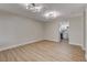 Spacious living room featuring modern lighting and ample natural light at 4512 Mark Ave, Las Vegas, NV 89108
