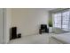 Spacious bedroom with large window and neutral decor at 4869 S Torrey Pines Dr # 101, Las Vegas, NV 89103