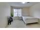 Bright bedroom with a double bed, window, and ample floor space at 4869 S Torrey Pines Dr # 101, Las Vegas, NV 89103