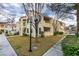 Two-story building with Spanish-style architecture, balconies, and a walkway at 4869 S Torrey Pines Dr # 101, Las Vegas, NV 89103