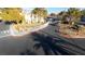 Community entrance with gated access, landscaping, and parking area at 4869 S Torrey Pines Dr # 101, Las Vegas, NV 89103