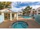 Relaxing pool and spa area with a covered patio and surrounding fence at 4869 S Torrey Pines Dr # 101, Las Vegas, NV 89103