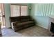 Open living room with a large window and comfortable reclining sofa at 5266 Lisagayle Ct # 124, Las Vegas, NV 89103