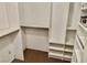 Organized walk-in closet with shelving and rods at 5266 Lisagayle Ct # 124, Las Vegas, NV 89103