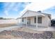 Backyard with a stucco fence, concrete patio and walkway and xeriscape landscaping at 536 Roberta Alecia Ave, North Las Vegas, NV 89031