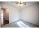 Bedroom with a ceiling fan and closet with sliding doors at 536 Roberta Alecia Ave, North Las Vegas, NV 89031