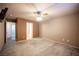 Bedroom with a ceiling fan and view to the hallway at 536 Roberta Alecia Ave, North Las Vegas, NV 89031