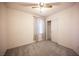 Cozy bedroom with neutral carpet, window, and closet at 536 Roberta Alecia Ave, North Las Vegas, NV 89031