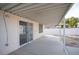 Covered patio with textured concrete floor offering an ideal space for outdoor relaxation and entertaining at 536 Roberta Alecia Ave, North Las Vegas, NV 89031