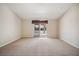 Bedroom with large sliding glass door that provides access to outdoor space at 5625 W Agate Ave, Las Vegas, NV 89139