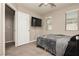 Bedroom with carpet flooring, neutral walls, and a ceiling fan at 6356 Blue Twilight Ct, Las Vegas, NV 89108