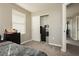 Cozy bedroom features natural light, neutral walls, and a closet for ample storage at 6356 Blue Twilight Ct, Las Vegas, NV 89108