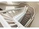 Staircase features white railings, carpeted steps, and ample natural light at 6356 Blue Twilight Ct, Las Vegas, NV 89108