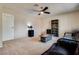 Relaxing bedroom with a comfortable couch and bookcase at 6520 Brushwood Ln, Las Vegas, NV 89107