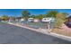 RV parking area with several RVs and trailers at 6520 Brushwood Ln, Las Vegas, NV 89107