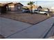 Residential street view featuring a home with xeriscaped yard at 6741 Solaron Ave, Las Vegas, NV 89156