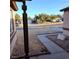 View of a walkway leading up to a front entrance with xeriscaping at 6741 Solaron Ave, Las Vegas, NV 89156