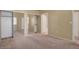 Bedroom with carpet and mirrored sliding door closets at 700 Carnegie St # 3711, Henderson, NV 89052