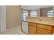 Bright kitchen featuring wood cabinets and a stainless steel sink at 700 Carnegie St # 3711, Henderson, NV 89052