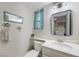 Bright bathroom with blue accents, modern sink, and charming decorative touches at 714 Arrowhead Trl, Henderson, NV 89002