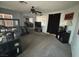 A spacious bedroom with neutral colored walls and carpet at 7511 Shadow Estates Way, Las Vegas, NV 89113