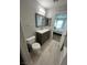 Updated bathroom with vanity, toilet, and tub at 7732 Hand Woven Ct, Las Vegas, NV 89149