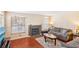 Living room with hardwood floors and fireplace at 7987 Cina Ave, Las Vegas, NV 89147