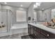 Modern bathroom featuring a soaking tub and double vanity at 825 Great Sky Ct, North Las Vegas, NV 89084