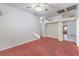 Bedroom featuring a ceiling fan, neutral walls, and easy access to other rooms at 1056 Flatfoot Ave, Henderson, NV 89012