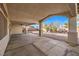 Large covered patio area offering ample space and an open view of the outdoor landscape at 1056 Flatfoot Ave, Henderson, NV 89012