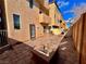 Enclosed backyard featuring stone pavers and a fire pit with block seating at 10840 Holmfield St, Henderson, NV 89052