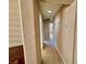 Hallway with carpet and neutral walls leading to other rooms at 10840 Holmfield St, Henderson, NV 89052