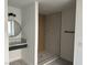 Modern bathroom featuring a stylish vanity and a walk-in shower with elegant tiling at 121 Comstock St, Pahrump, NV 89048