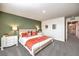 Main bedroom with king-size bed and an accent wall at 177 Biscotti Ave # Lot 14, North Las Vegas, NV 89084