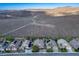 Aerial view of a neighborhood featuring well-maintained homes with desert landscape at 2012 Poetry Ave, Henderson, NV 89052