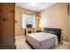 Bedroom with a queen-size bed and ample closet space at 2012 Poetry Ave, Henderson, NV 89052