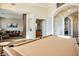 Spacious billiard room with a pool table, hardwood floors, and ample space for entertaining and relaxation at 2012 Poetry Ave, Henderson, NV 89052