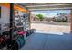 Organized garage with storage and space for vehicles and equipment at 2012 Poetry Ave, Henderson, NV 89052