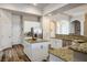 Kitchen with white cabinets, an island, and stainless steel appliances at 2012 Poetry Ave, Henderson, NV 89052