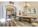 Bright entryway featuring hardwood floors, and a games table at 2012 Poetry Ave, Henderson, NV 89052