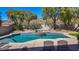 Backyard pool with spa and mature landscaping at 2012 Poetry Ave, Henderson, NV 89052