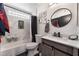 Modern bathroom with marble tile and updated vanity at 2258 Ray Kanel Dr, Las Vegas, NV 89156