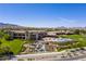 Aerial view of the community clubhouse with a pool and lush landscaping at 2277 Canyonville Dr, Henderson, NV 89044